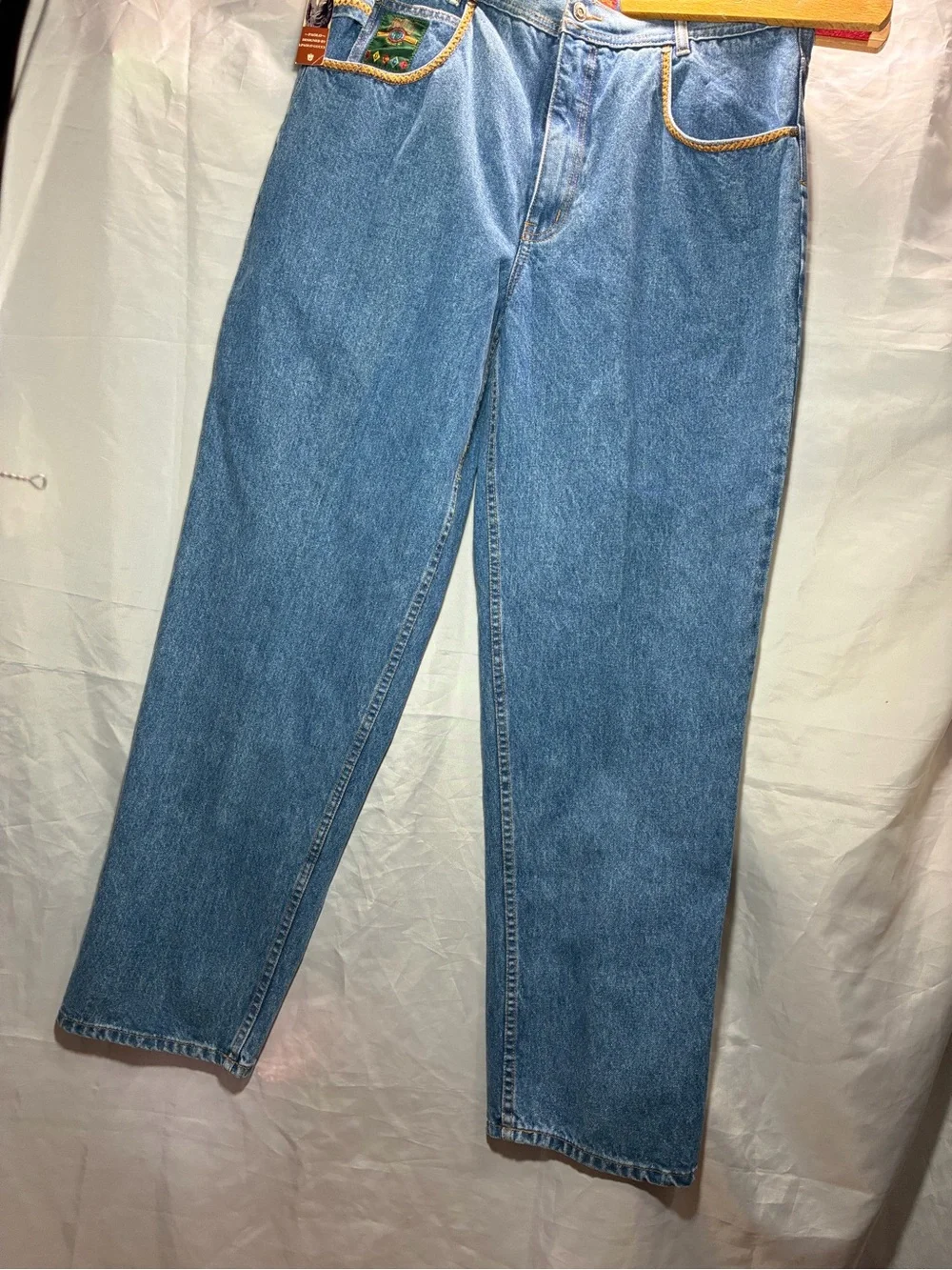Relaxed Light Blue Men's Jeans with Embroidered Pocket Detail